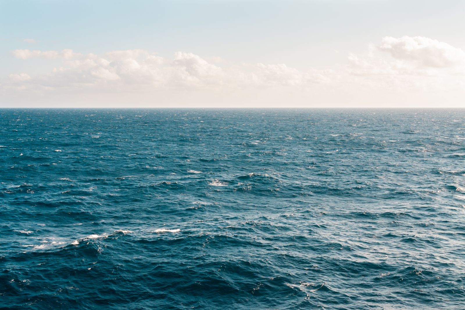 Open water under a quiet sky